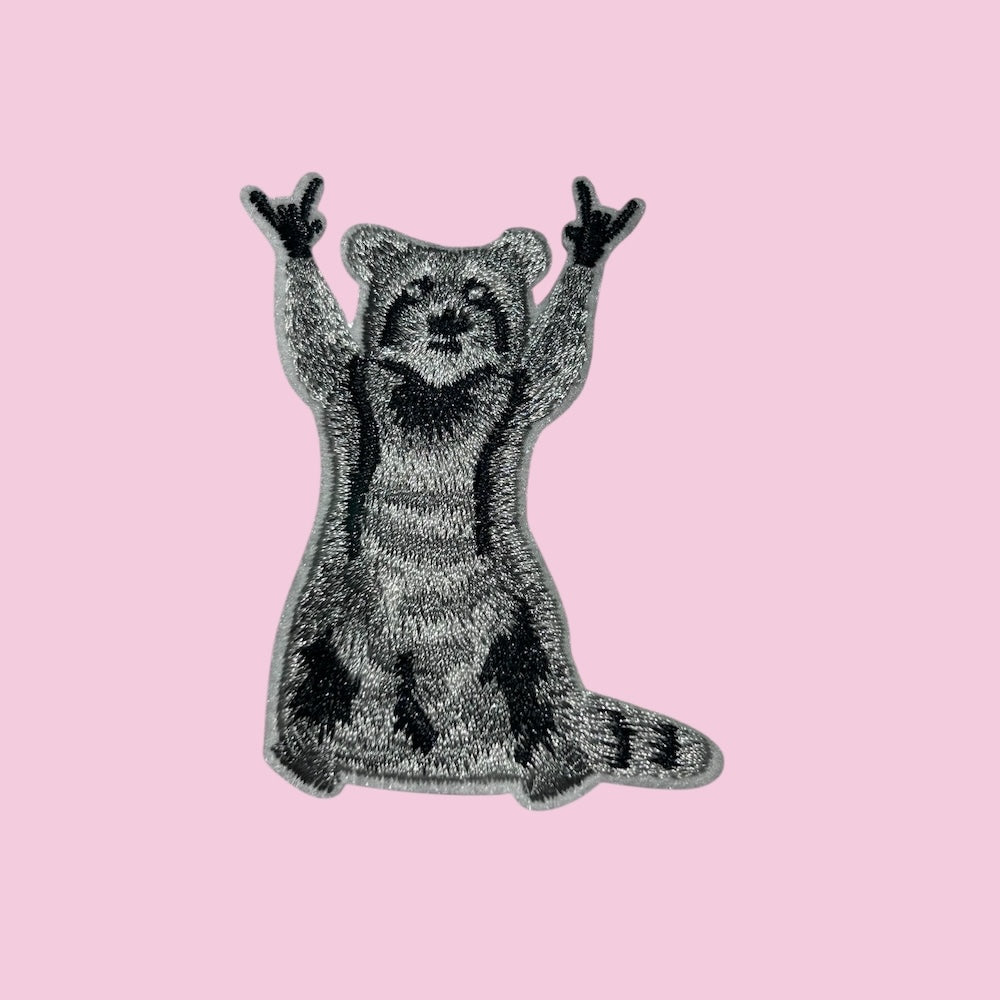 Rocking racoon embroidery patch