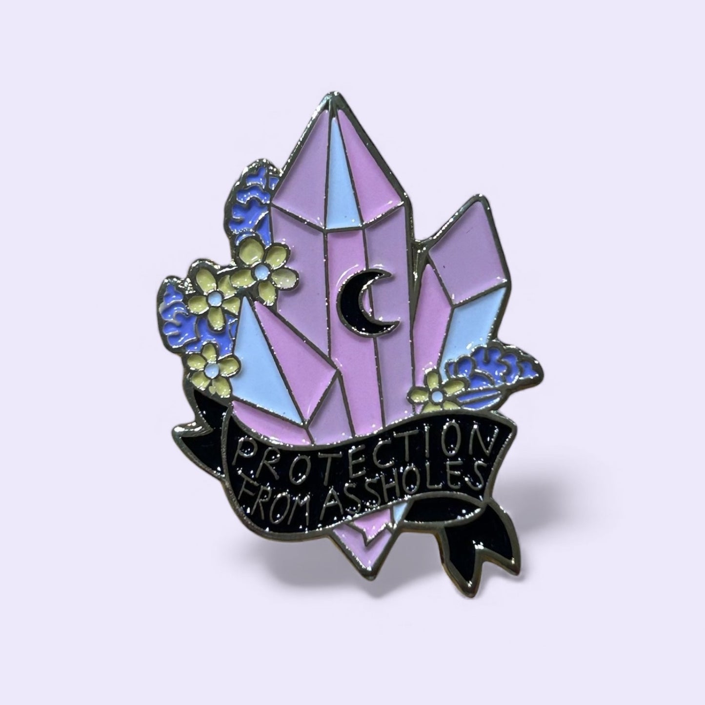 Crystal protection from assholes enamel pin