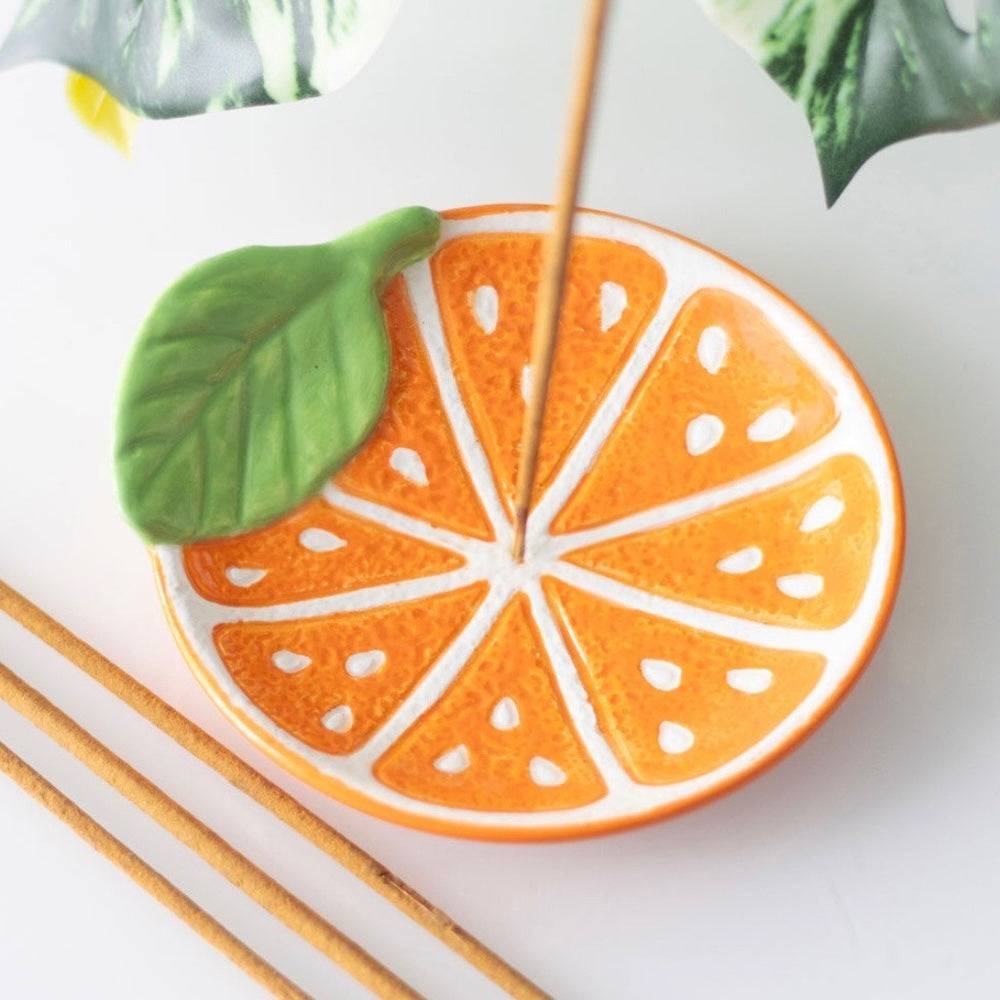 Orange ceramic incense holder