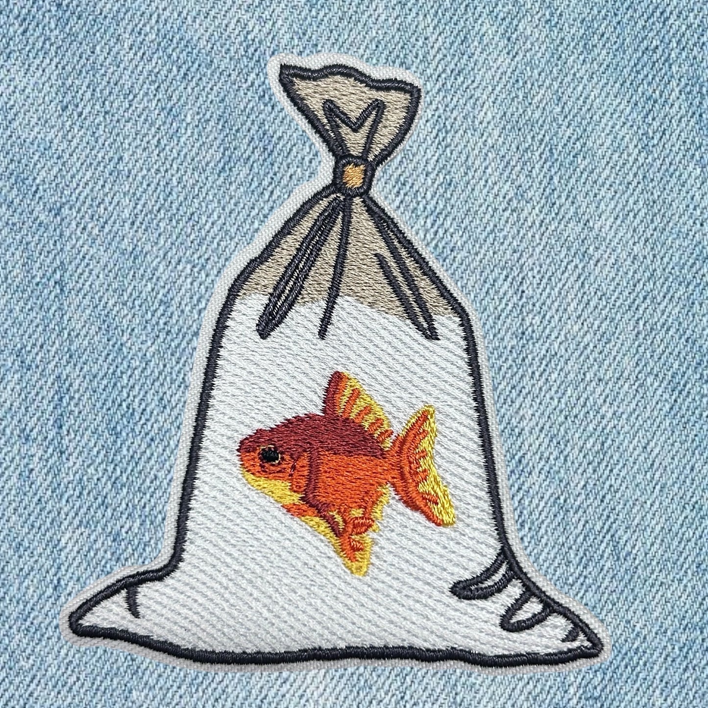 Fish in a bag embroidery patch