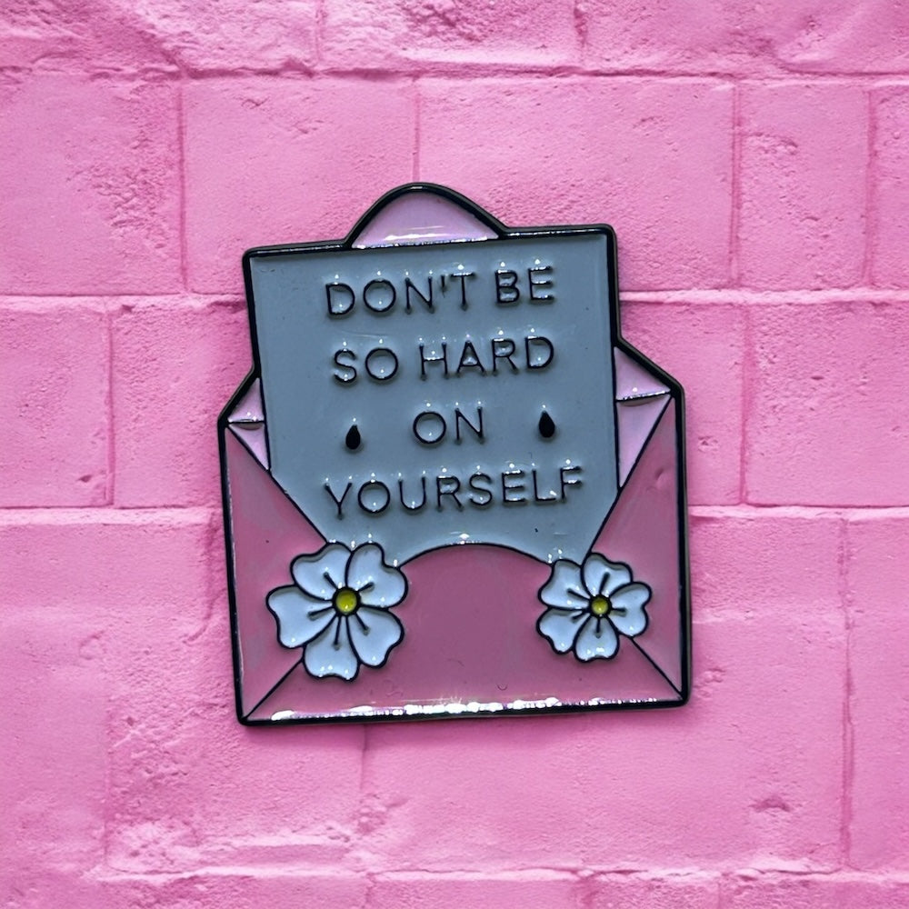 Don't be so hard on yourself enamel pin