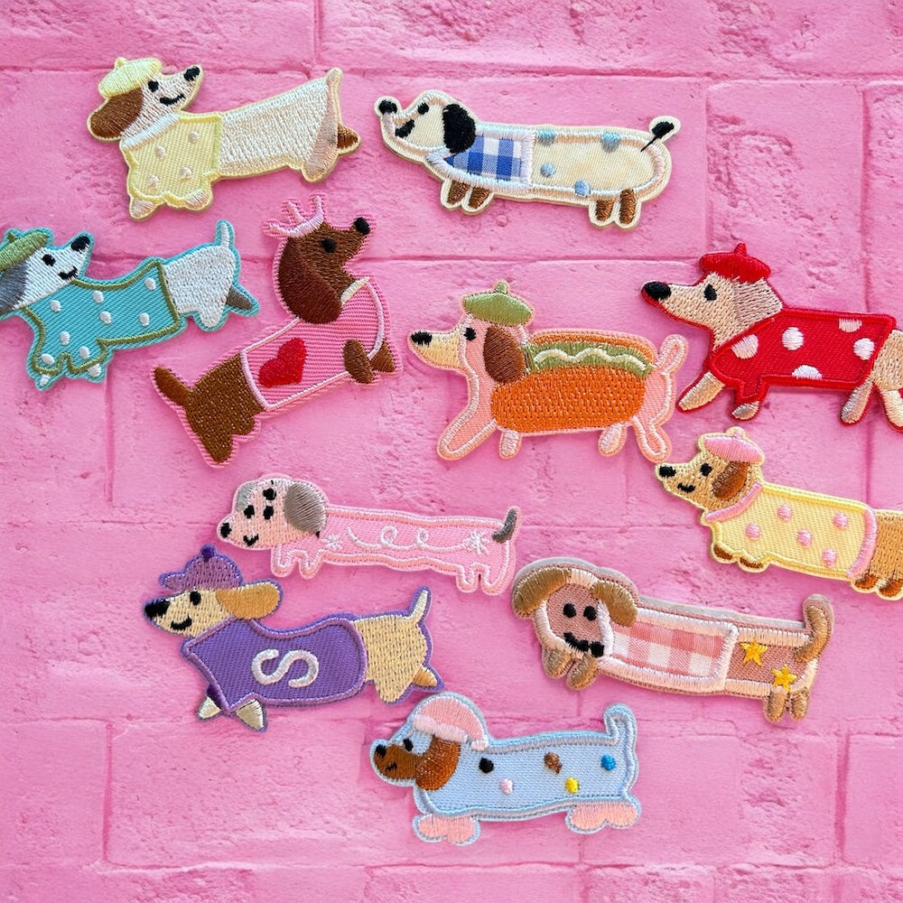 Dressed up sausage dogs embroidery patch
