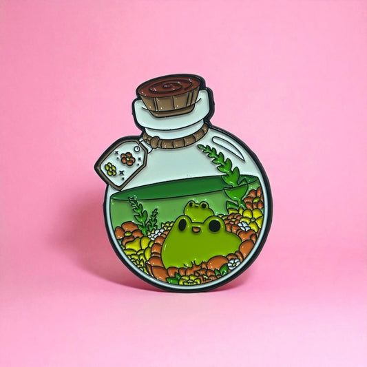 Frog potion flowers enamel pin