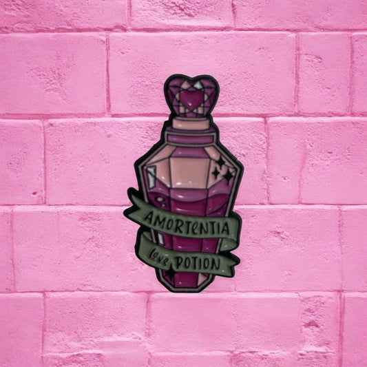 Pink heart potion enamel pin